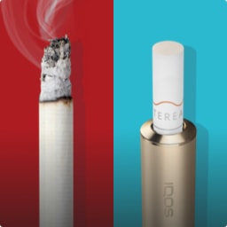 Lit cigarette end compared to IQOS TEREA stick in IQOS ILUMA  holder.